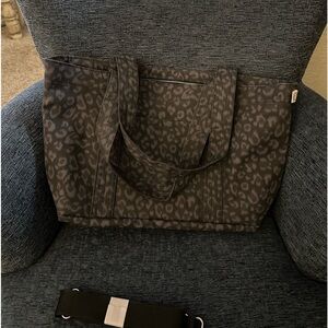 This is a Quilted Koala tote bag. Brand new